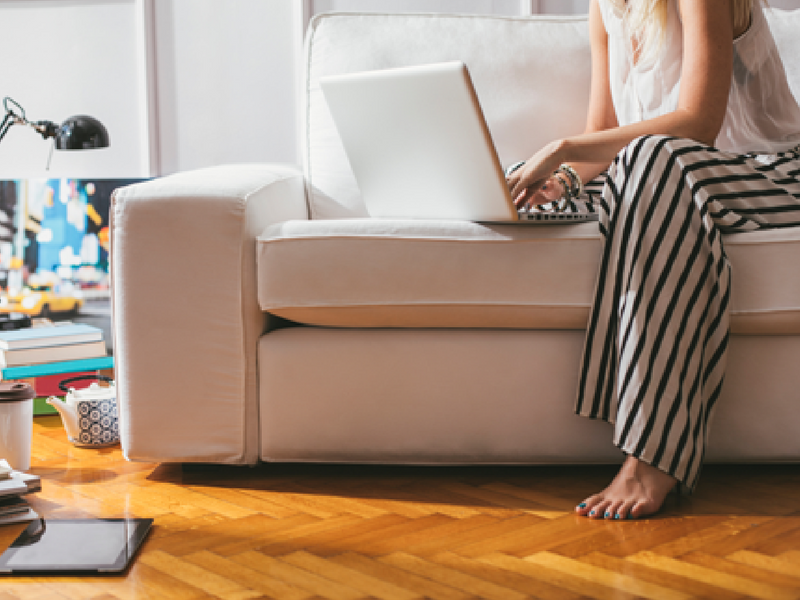 blogger sitting on couch